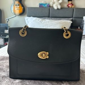 Black coach purse with adjustable strap